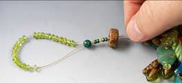 Clay and glass beads on beading wire